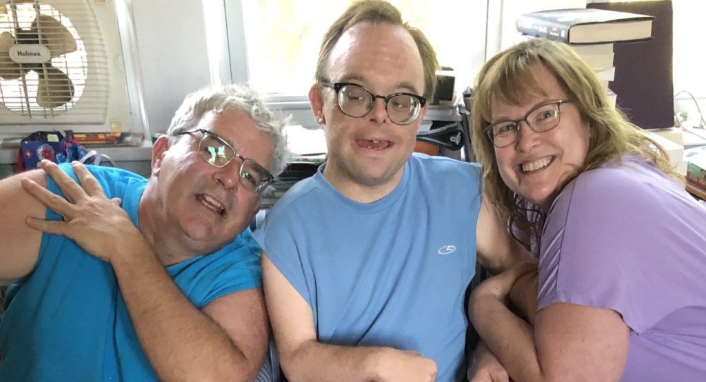 Jean, Paul, and David Bender smiling for a family picture